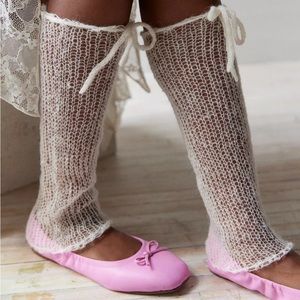 Ivory white open knit bow sheer leg warmers